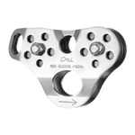 A silver stainless steel trolley with multiple holes and a directional arrow etched on it.